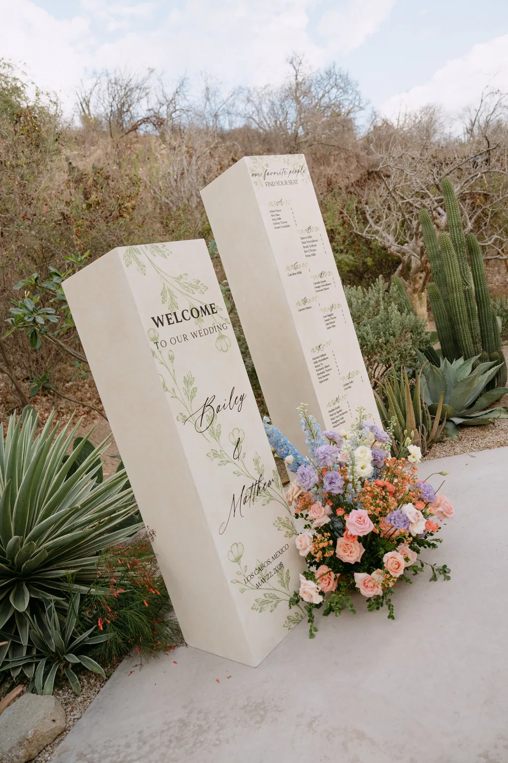 The seating chart standing among the agaves at Acre