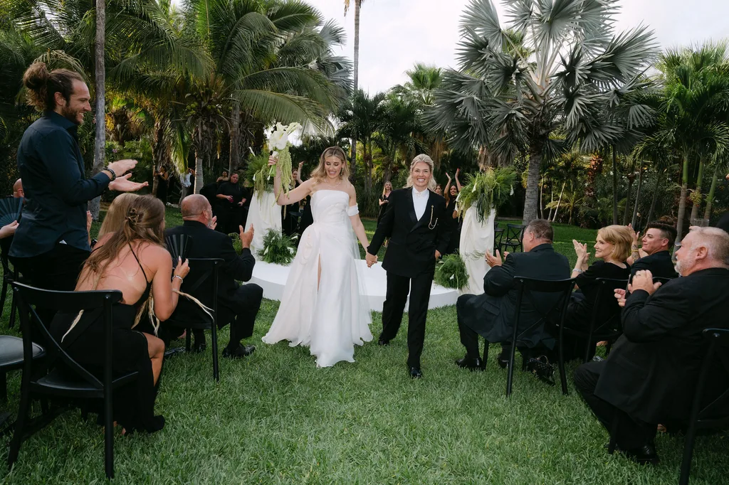 Walking back down the aisle while everyone claps