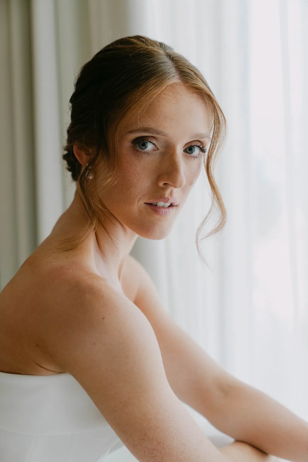 Lauren looking back over her shoulder before the ceremony