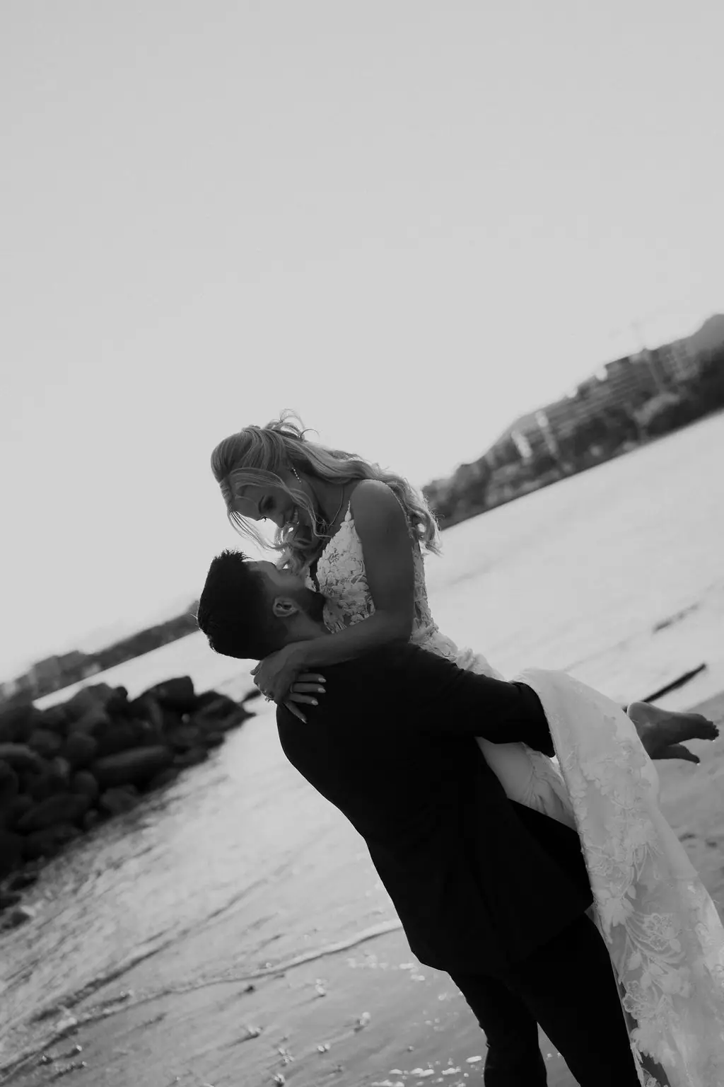 The dip on the stone pier, black and white