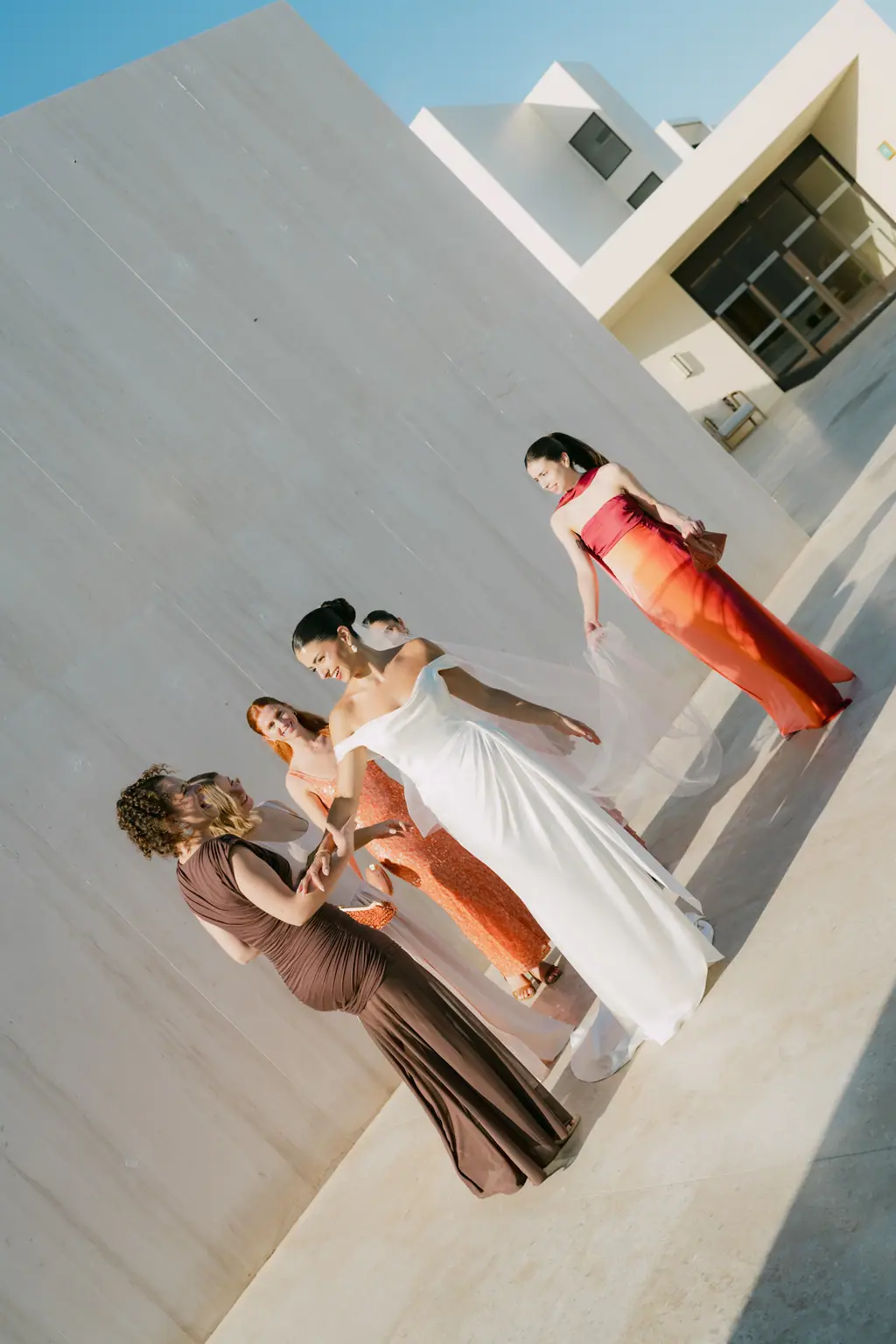 Bride laughing at the bar
